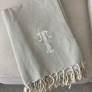Throw Blanket. Like new. Grey/ivory/white. Embroidered T initial.